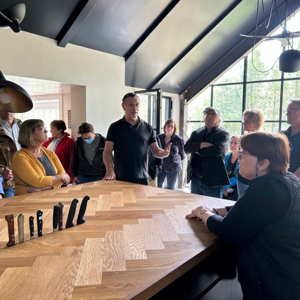 a group of people sitting at a table