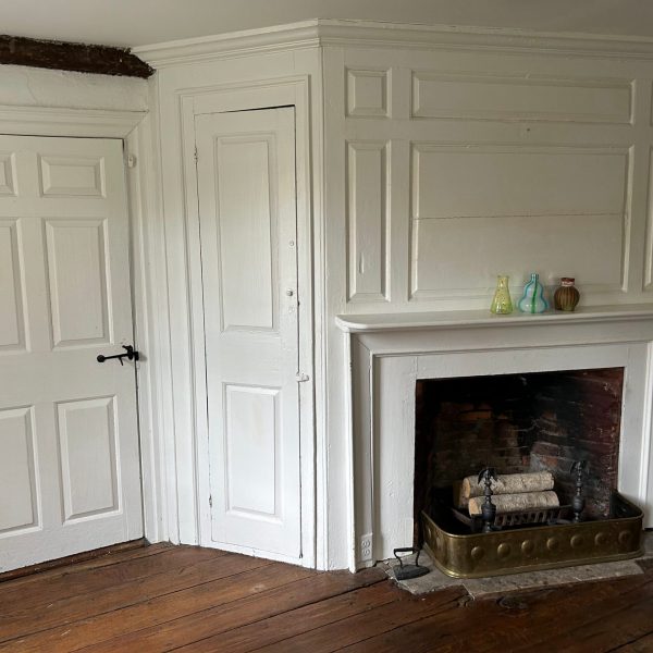 a living room with a fireplace