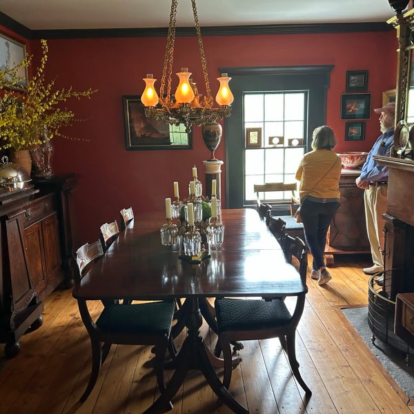 a living room filled with furniture and a fire place
