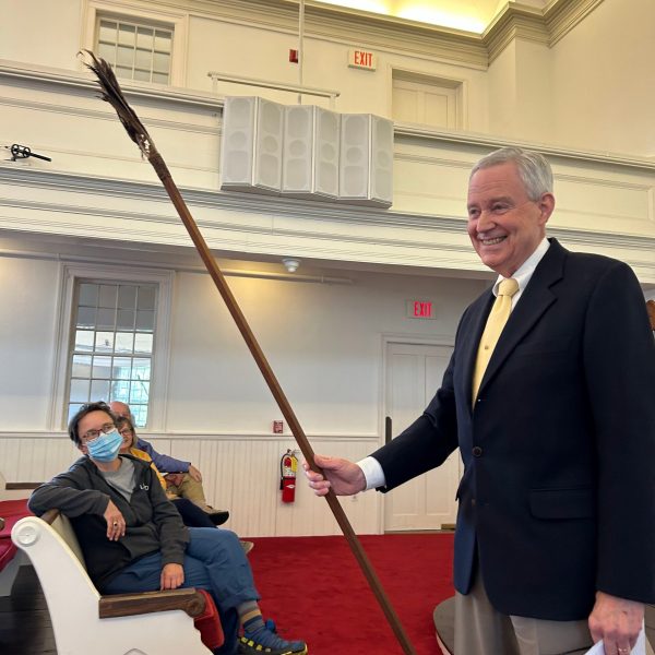 a group of people standing in a room
