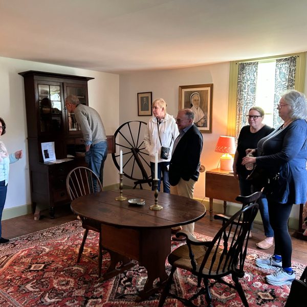 a group of people standing in a room