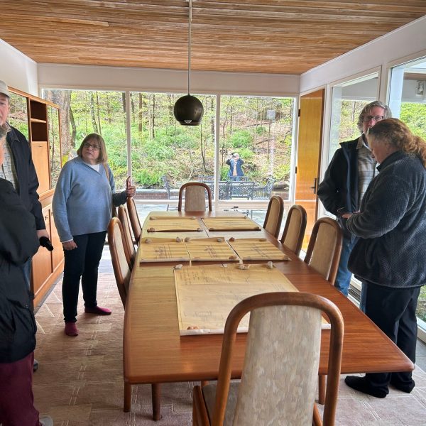 a group of people sitting at a table