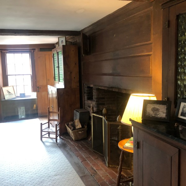 a room filled with furniture and a large window