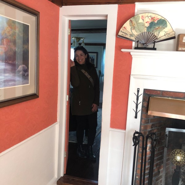 a person standing in front of a window