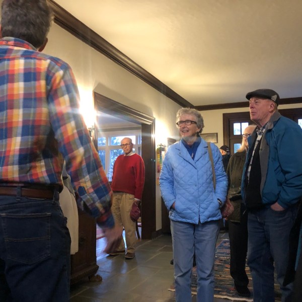 a group of people standing in a room