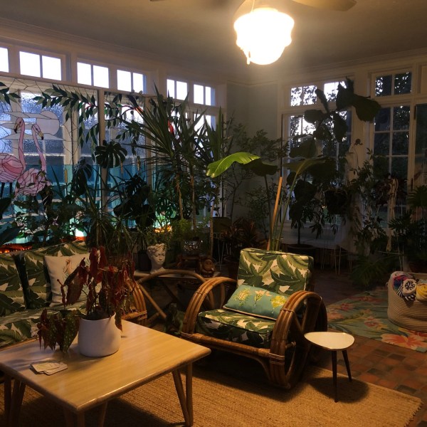 a living room filled with furniture and a fire place