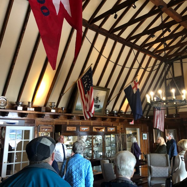 a group of people standing in front of a building