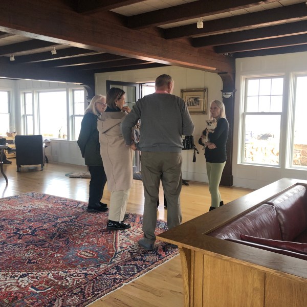 a group of people standing in a room