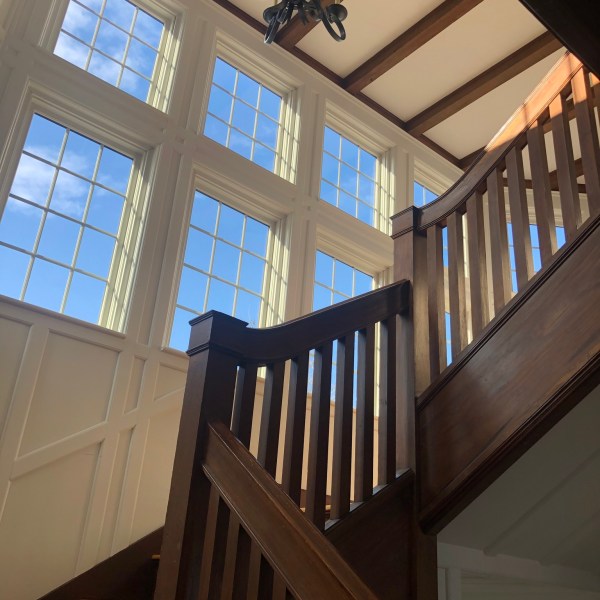 a chair sitting in front of a building