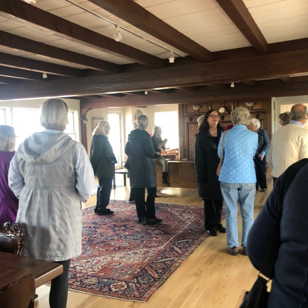 a group of people standing in a room