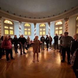 a group of people standing in a room