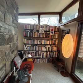 a room with a book shelf