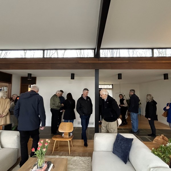 a group of people standing in a room