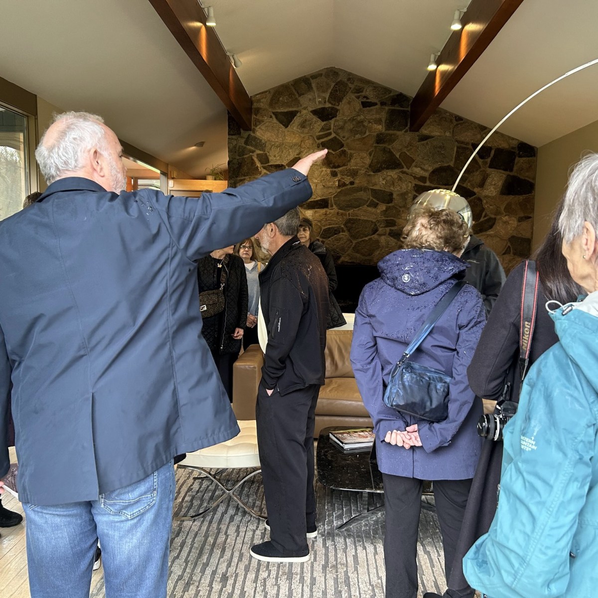 a group of people standing in a room