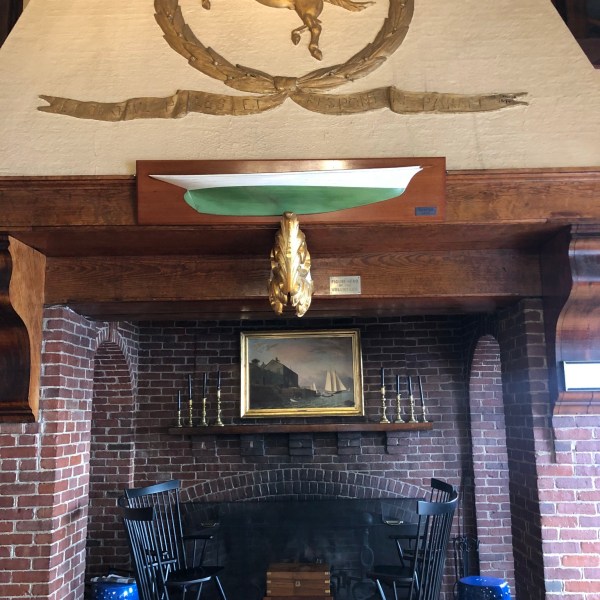 a fire place sitting in a chair