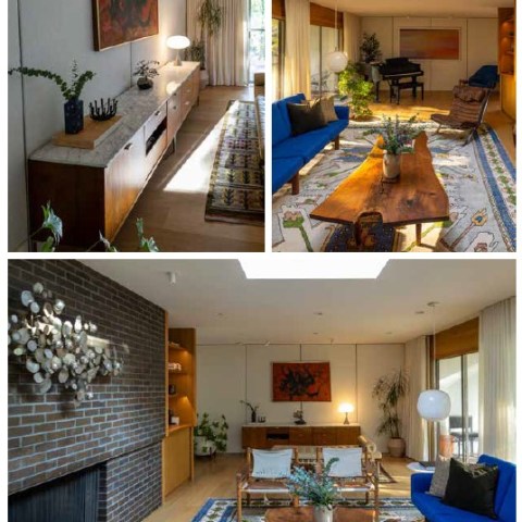 a living room filled with furniture and vase of flowers on a table