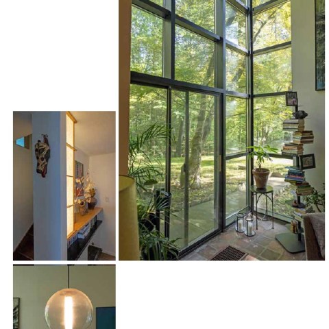 a room filled with furniture and a large window