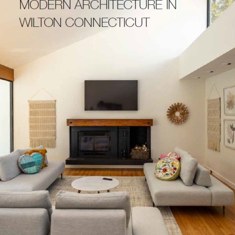 a living room filled with furniture and a flat screen tv