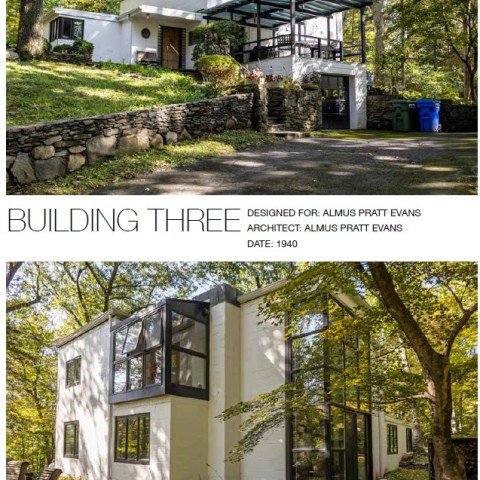 a tree in front of a house