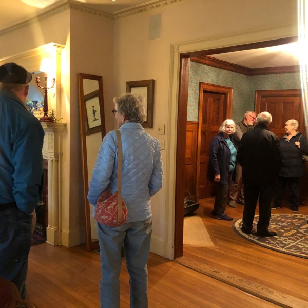 a group of people standing in a room