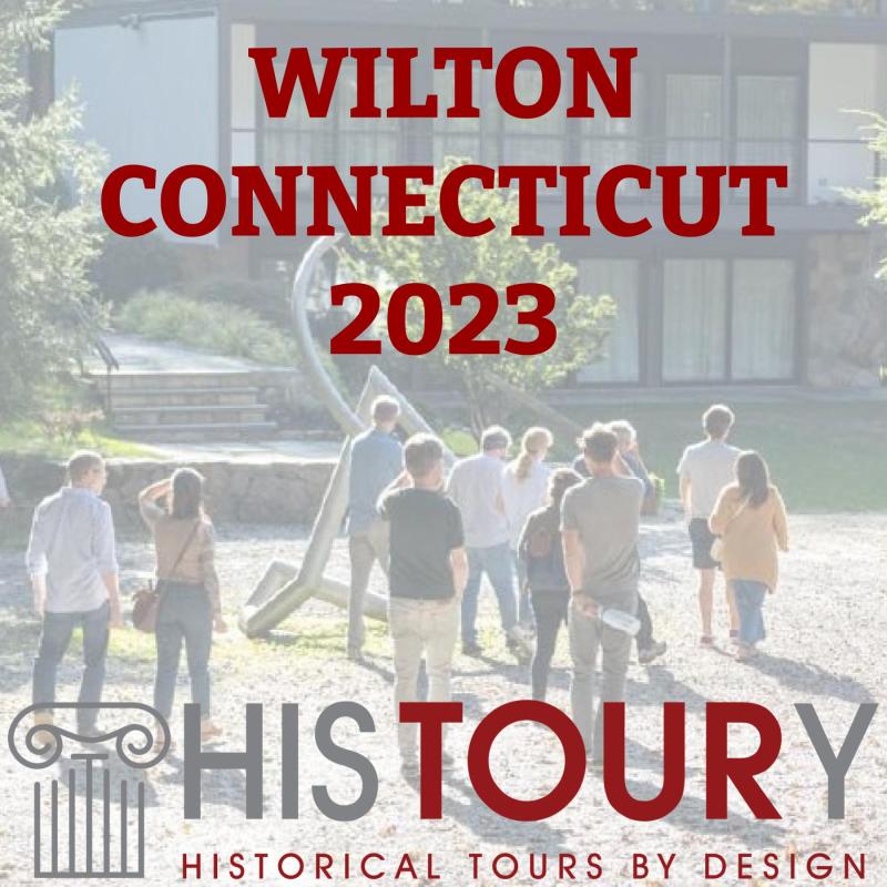 a group of people in front of a sign