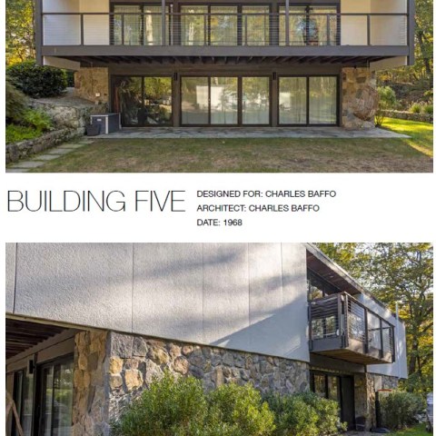 a house that has a sign on the side of a building