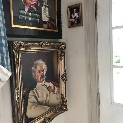 a person standing in front of a mirror posing for the camera