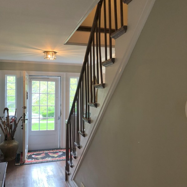 a room filled with furniture and a large window