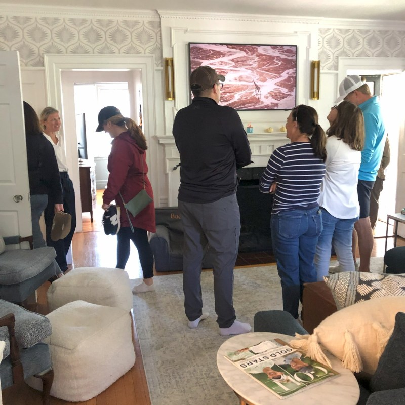 a group of people standing in a room