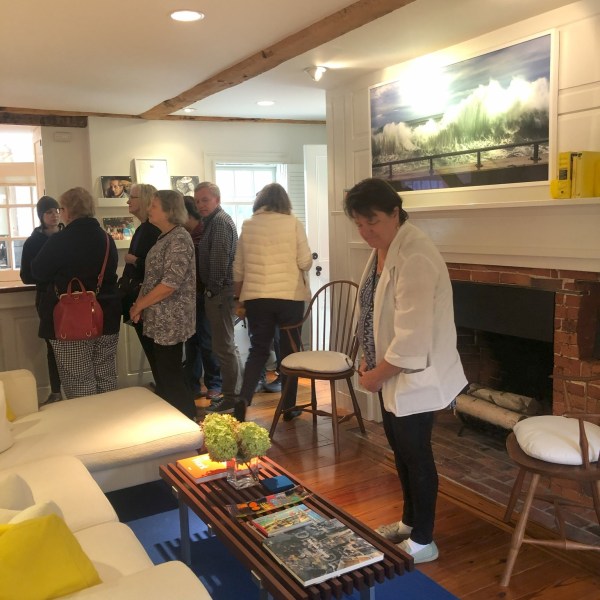a group of people standing in a room