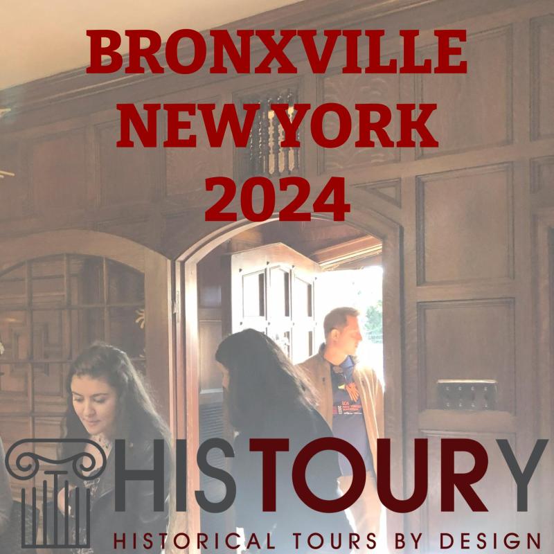 a group of people standing in front of a sign