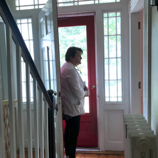 a person standing in front of a window