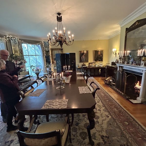 a room filled with furniture and a fireplace