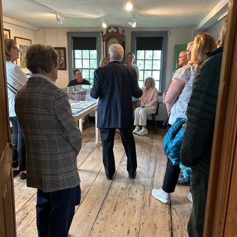 a group of people standing in a room