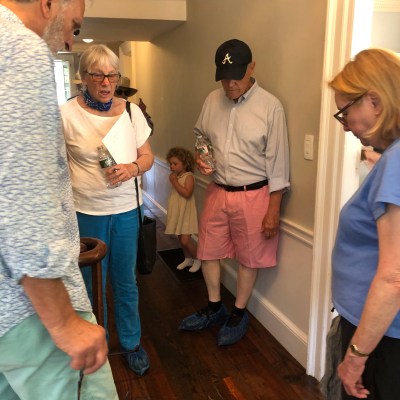a group of people standing in a room