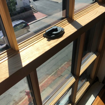 a bench in front of a window