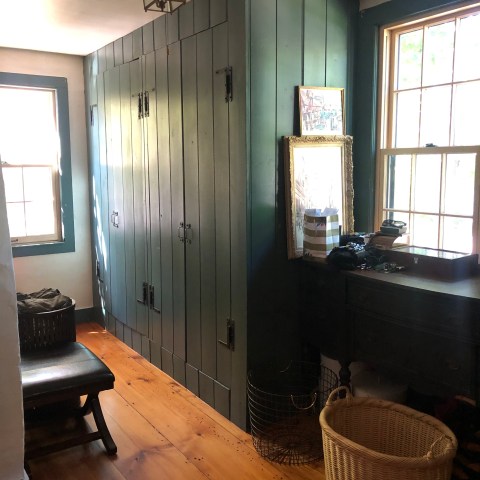 a room filled with furniture and a large window