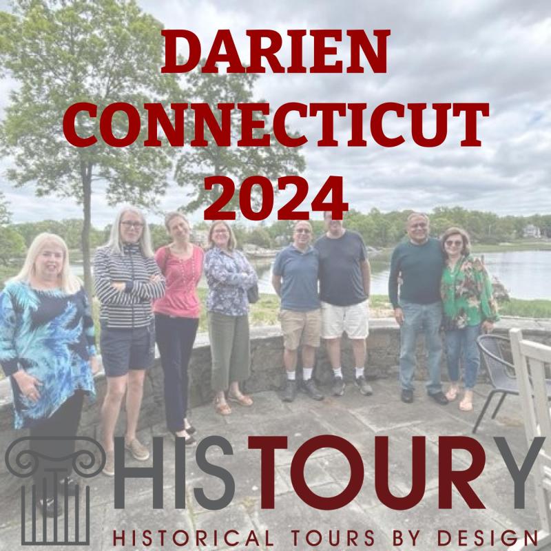 a group of people holding a sign