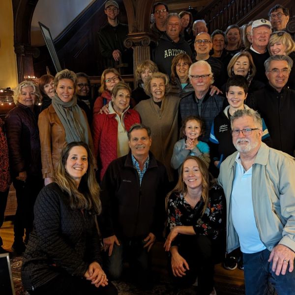 a group of people posing for a photo