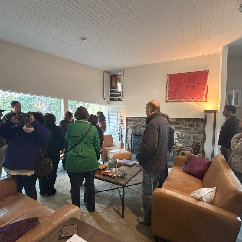 a group of people standing in a room