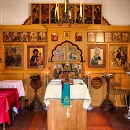 a living room filled with furniture and a fireplace