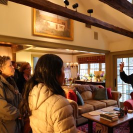 a group of people standing in a room