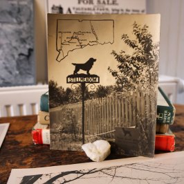 a sign on a wooden table