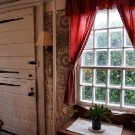 a chair sitting in front of a window