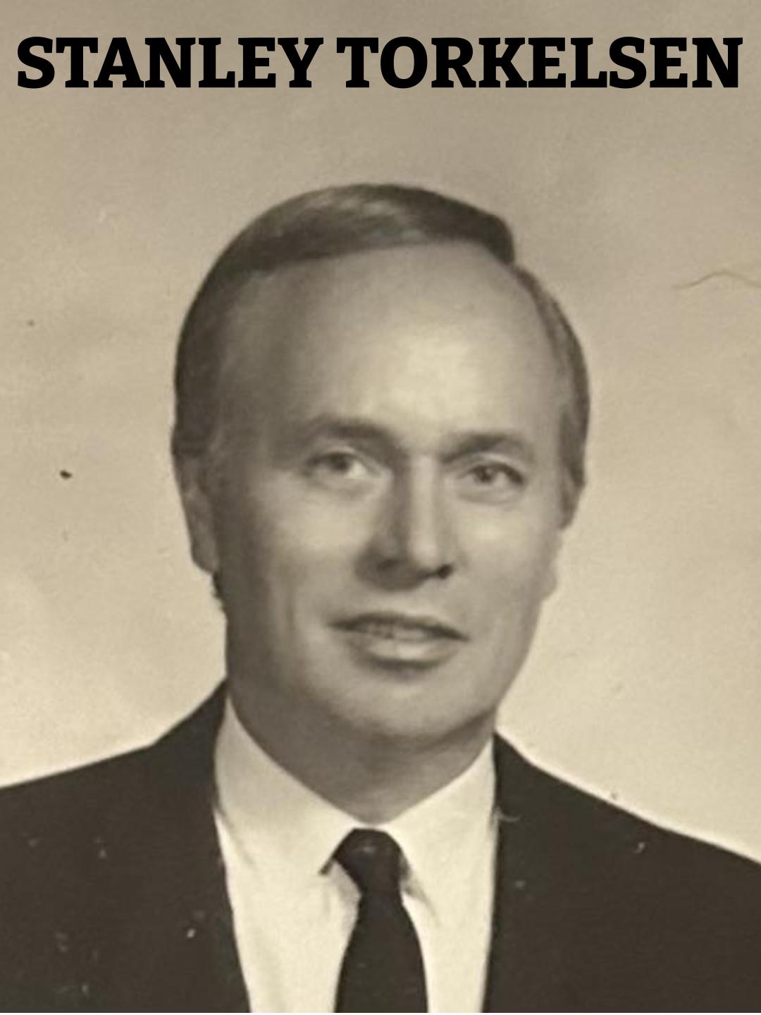 A&A Cover Stanley M. Torklesen Black and white portrait of a man in a suit with text 'STANLEY TORKELSEN' above.